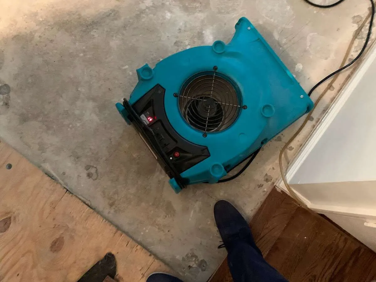Air mover drying subfloor during Leak Detection & Repair in Kennewick